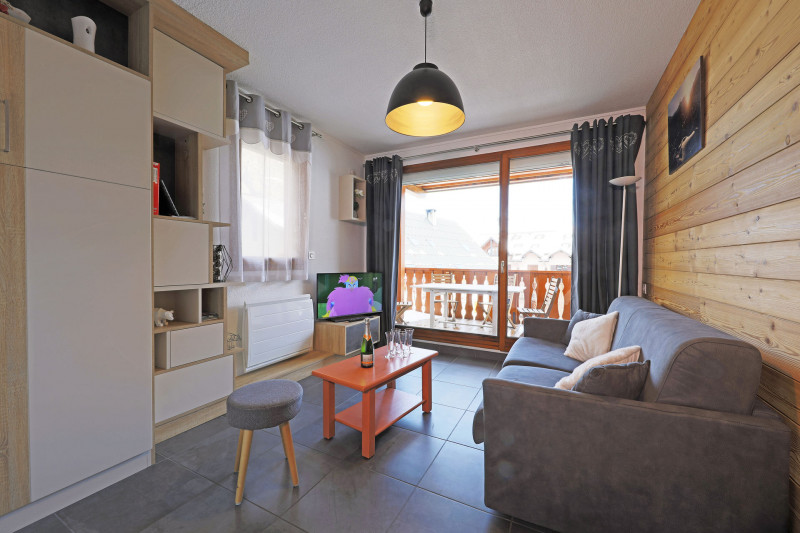 SALON - APPARTEMENT ROCHES FLEURIES B1 - VALLOIRE CENTRE - VALLOIRE RESERVATIONS SALON - APPARTEMENT ROCHES FLEURIES B1 - VALLOIRE CENTRE - VALLOIRE RESERVATIONS